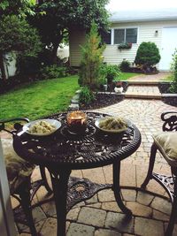 Table and chairs in yard