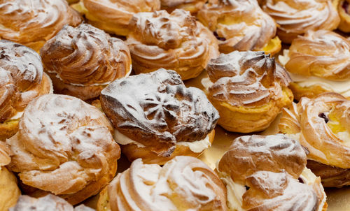 Cream puffs filled with cream and fruity cherries