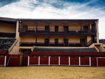 View of building against cloudy sky