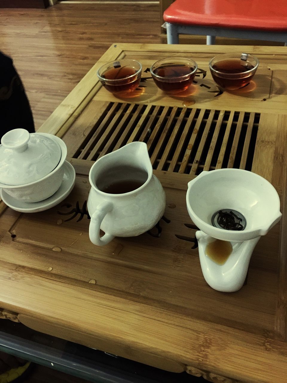 indoors, table, food and drink, coffee cup, drink, coffee - drink, refreshment, saucer, still life, wood - material, high angle view, plate, cup, freshness, coffee, empty, spoon, wooden, chair, tea cup