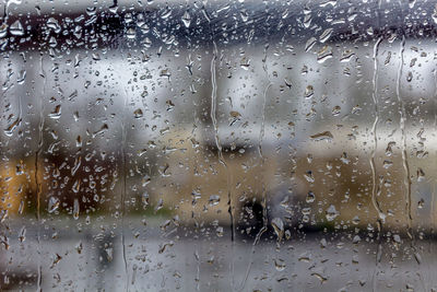 Close-up of water drops on glass