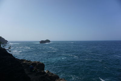 Scenic view of sea against clear sky