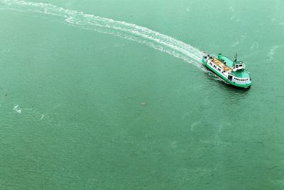 High angle view of ship sailing on sea