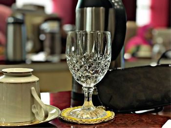 Close-up of wine in glass on table