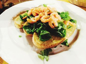 Close-up of served food in plate