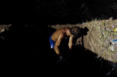 High angle view of woman enjoying at night