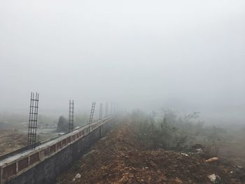 Scenic view of fog against sky