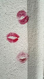 Close-up of red heart shape on wall