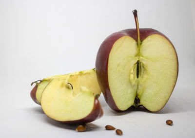 Close-up of apple against white background