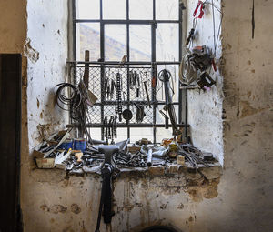 Abandoned building seen through window