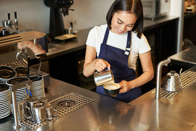 Young woman working at table