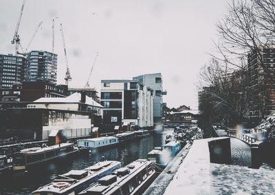 City against clear sky during winter