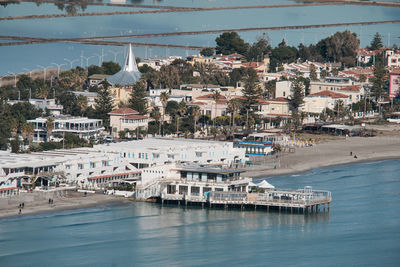 View of buildings by sea