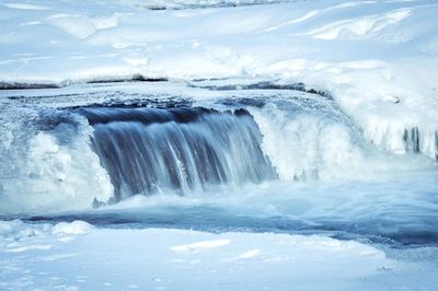 Scenic view of frozen sea against sky