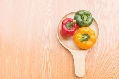 High angle view of bell peppers on cutting board