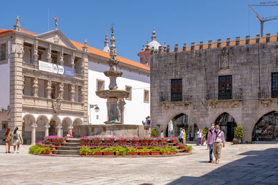 Group of people in front of building