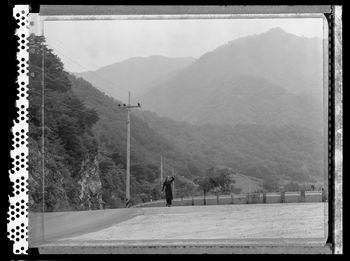Scenic view of landscape against mountains