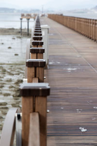 Close-up of wooden post on pier