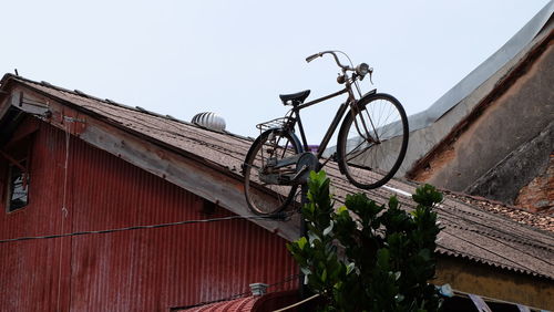 Low angle view of bicycle against clear sky