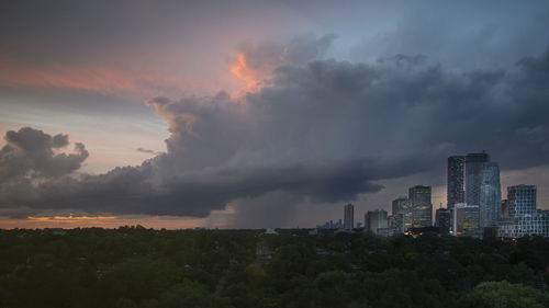 Panoramic view of buildings against sky during sunset