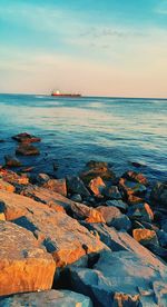 View of calm sea against cloudy sky