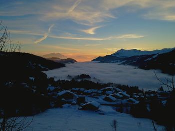 Scenic view of mountains against sky during winter