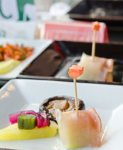 Close-up of dessert served on table