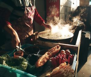 Woman cooking street food