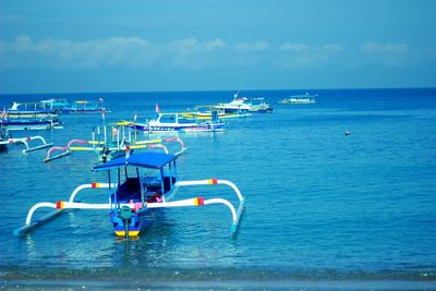 Scenic view of sea against blue sky