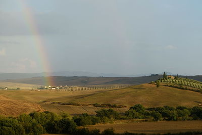 Picturesque landscape in toscany with rainbow
