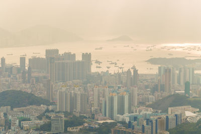 High angle view of buildings in city against sky