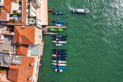 Top down view of moored empty venetian gondolas