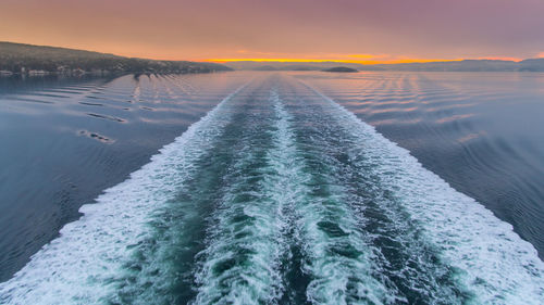 Scenic view of snow against sky during sunset