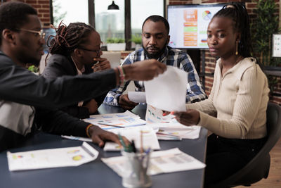 Business colleagues working at office