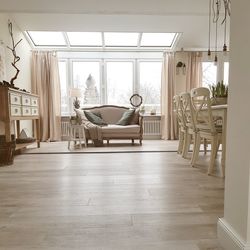 Chairs and table on floor in house