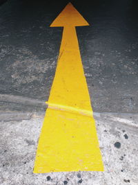 Arrow sign on road