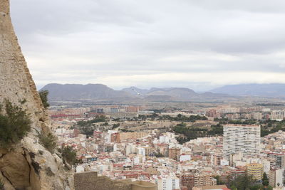 Buildings in city against sky