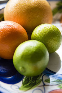 Close-up of oranges on table