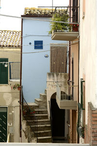 View of residential buildings against sky