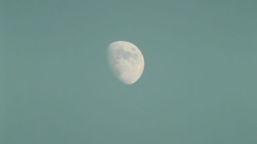 Low angle view of moon against sky