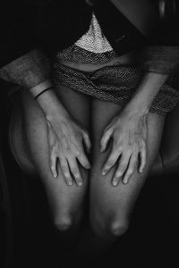 Low section of woman standing on floor