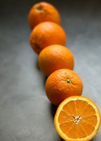 Close-up of oranges on table