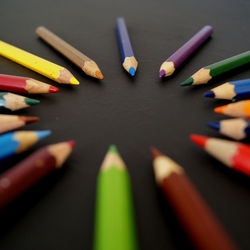 High angle view of colored pencils on table