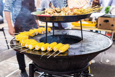 Close-up of meat on barbecue grill