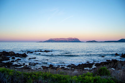 Scenic view of sea against sky during sunset