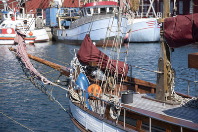 High angle view of boats moored at harbor