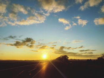 Road against sky during sunset