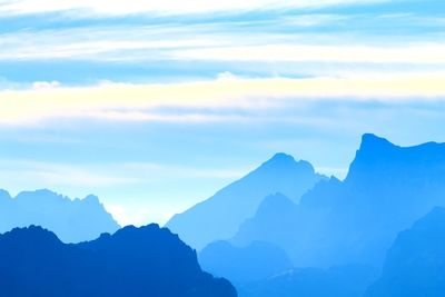 Scenic view of mountains against sky during sunset