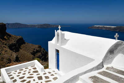 Scenic view of sea against clear blue sky