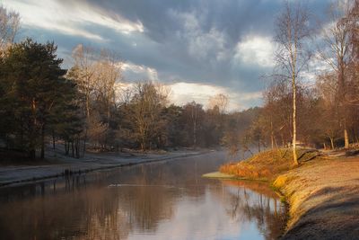 Scenic view of lake against sky during autumn